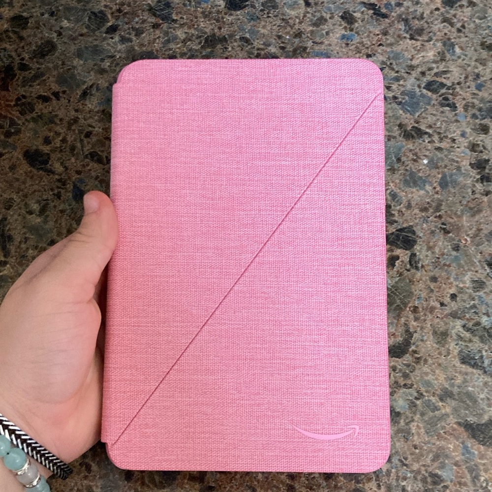 It’s brand new! Very soft  in inside the case! The back folds.
